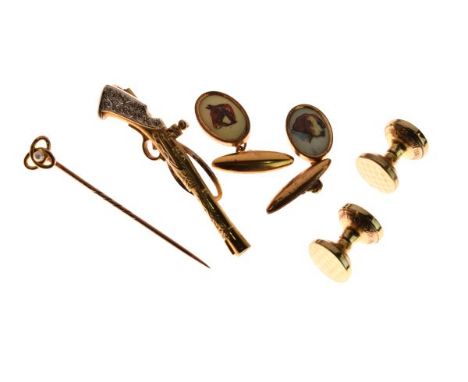 Small group of dress jewellery comprising: a stickpin inset with seed pearl, a rifle brooch, a pair of cufflinks decorated wi