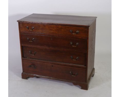 GEORGE III OAK CHEST OF DRAWERS, the moulded oblong top above four long, graduated drawers fitted with swan neck handles, and