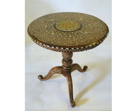 EARLY TWENTIETH CENTURY ANGLO INDIAN TEAK (?) AND BONE INLAID TRIPOD OCCASIONAL TABLE, the circular  top with a raised centra