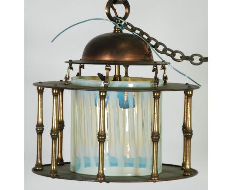 ARTS AND CRAFTS TINNED COPPER AND VASELINE HALL LANTERN, the domed top with ring suspension and heavy chain above a cylindric