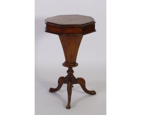 NINETEENTH CENTURY FIGURED WALNUTWOOD AND MARQUETRY INLAID PEDESTAL WORK BOX, the moulded octagonal top central with a inlaid