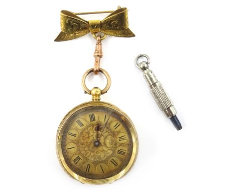 18ct gold Swiss key wound fob watch on rolled gold bow with 9ct rose gold clip