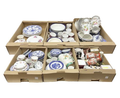 Mintons Delft dinner plates, together with a quantity of blue and white dinner wares by various makers including tureens, din