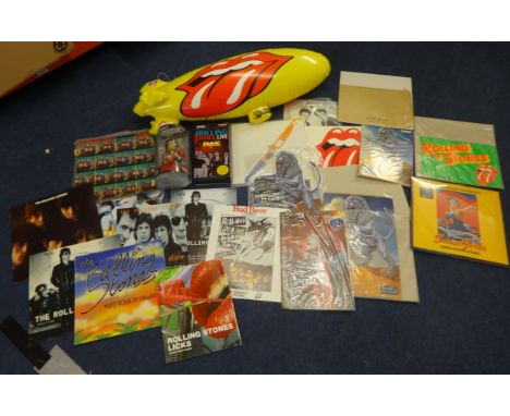 ROLLING STONES COLLECTION A collection including Mick Jagger Licks World Tour figure, various promotional material, Isle of W