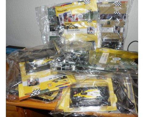 1.43 Scale x 10 Carded with Magazines Mixed Formula 1 Race cars. P&amp;P Group 1 (£14+VAT for the first lot and £1+VAT for su