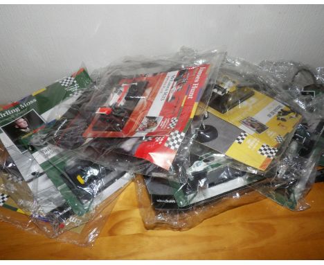 10x Carded with Magazines Mixed  Formula 1 Racing cars. P&amp;P Group 1 (£14+VAT for the first lot and £1+VAT for subsequent 