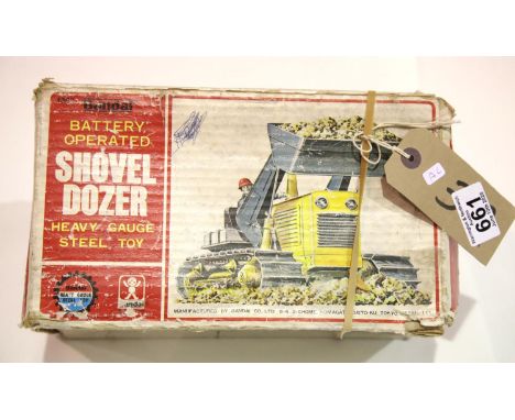Bandai battery operated shovel dozer steel toy. P&P Group 2 (£18+VAT for the first lot and £2+VAT for subsequent lots)Conditi