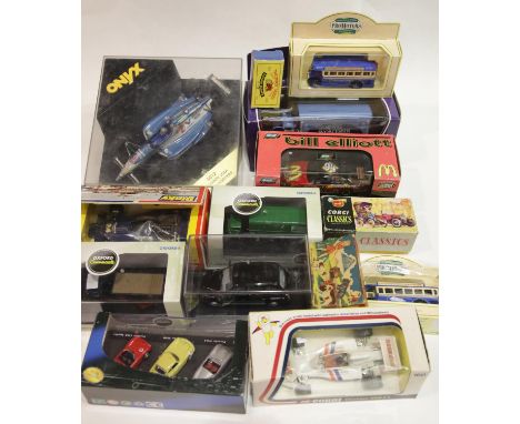 Twelve boxed diecast vehicles including racing cars and buses: Corgi, Dinky, Matchbox etc P&amp;P Group 2 (£18+VAT for the fi
