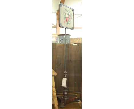 An early Victorian rosewood and tapestry inset polescreen 