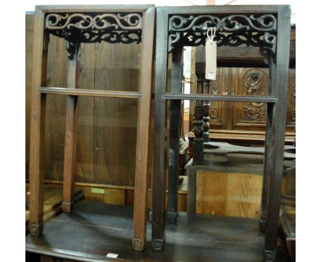 A near-pair of circa 1900 Chinese hardwood two-tier occasional tables, each with scroll carved and pierced frieze, w.42cm, d.