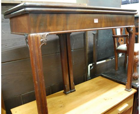 A George III mahogany card table, the fold-over top opening to reveal baize-lined playing surface, on double rear ogee moulde