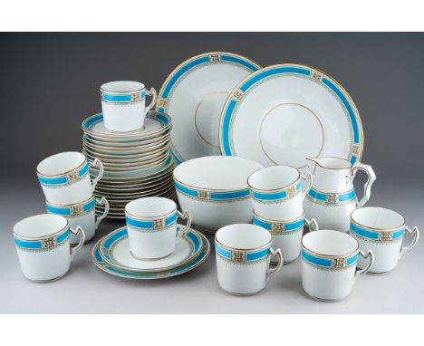 An early 20th Century Staffordshire pattern 6564 part tea service, white ground decorated with blue and gilt motif banging to