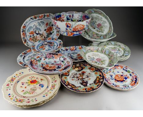 A Mason`s Ironstone Imari punch bowl and three various Imari plates, two impressed marks, one with factory mark together with