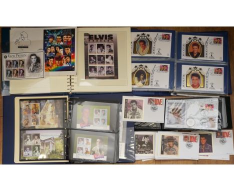 Quantity of Elvis Presley commemorative stamps in four albums and loose, including first day covers (1 box)