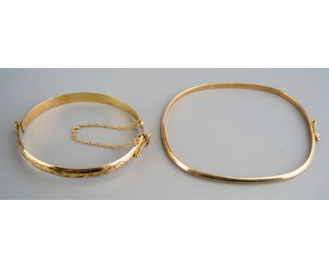 Yellow metal Bangle ( tests as 9ct gold) 3.3 g and rolled gold bangle (2)