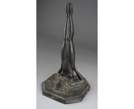 An Art Deco cast metal figure modelled as a female nude, Applied Arts British Made makers mark, RD 761888. Drilled to be a la