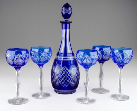 Blue glass decanter with 5 matching wine glasses