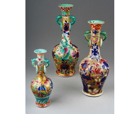 Three early 19th century Miles Mason Ironstone vases of twin handled baluster form, each with flared top rim, elongated neck 