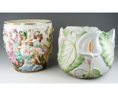 Two late 20th 21st century ceramic planters, one Capodimonte relief moulded with figures, the other of leaf design, heights 2