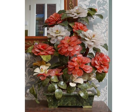 A 20th century Chinese hardstone flowering tree in a hardstone trough, height 72.5cm x width 59cm approx.