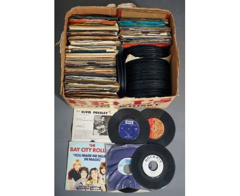 An assorted collection of 45RPM shellac singles, loose and in covers, 1950s to 80s to include all genres (easy listening, swi