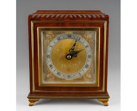 A second half 20th Century mahogany cased Elliott mantel clock of square form, gadrooned detail to top edge, silvered chapter