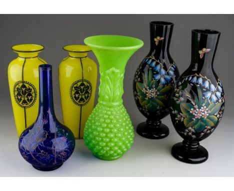 Collection of Victorian glass to include a pair of black enamel vases, yellow vases and large green uranium vase ( glows unde
