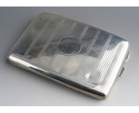 A George V silver engine turned cigarette case, vacant cartouche, hallmarked by Henry Wilkinson., Birmingham, 1919., approx g