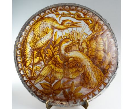A late 19th / early 20th century circular stained glass panel, leaded surround, the panel depicting two large water birds wit