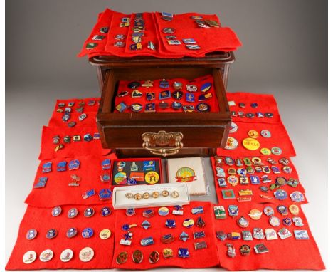 A collection of over 215 enamel Butlins pin badges, mostly from the 1950's and 1960's with some later issues, including a box