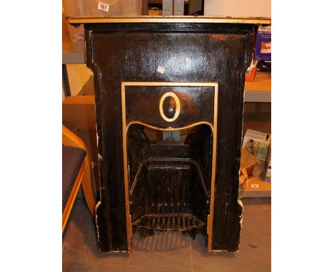 Cast Iron antique bedroom fire surround and grate. 69 x 95 cm