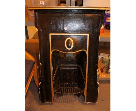 Cast Iron antique bedroom fire surround and grate. 69 x 95 cm