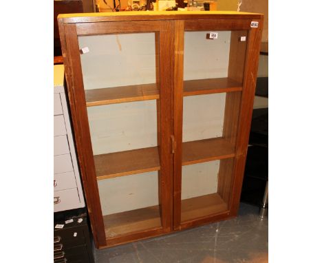 Oak three shelf display cabinet with glazed doors. 92 x 122 cm