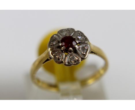 18 ct gold ruby and diamond cluster ring, size L