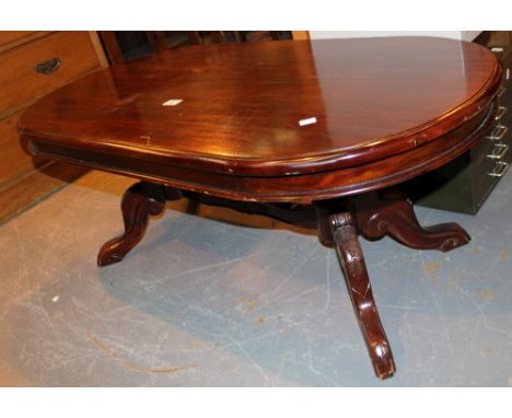 Mahogany coffee table with twin tripod legs