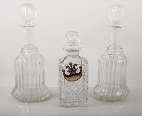 Lead crystal spirit decanter, with a silver label, 'WHISKY'; and a pair of Victorian moulded glass mallet-shaped decanters, (