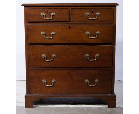 Victorian mahogany chest of drawers of small proportion, rectangular top with a moulded edge, fitted with two short and three