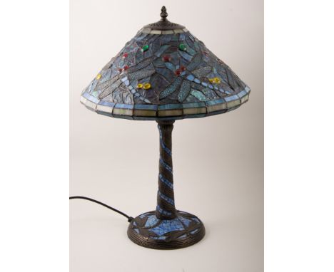 A pair of reproduction Tiffany style table lamps, coloured leaded light glass shades depicting dragonflies and glass jewels, 