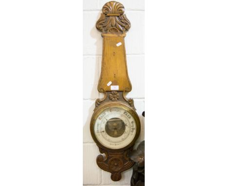 Carved oak aneroid banjo barometer (af), 94cm.
