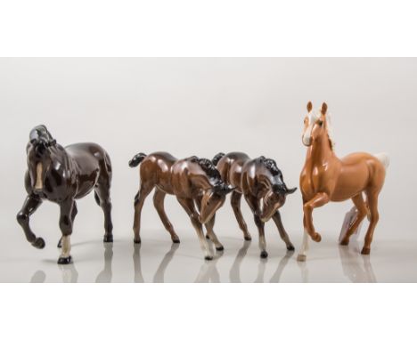 Beswick pottery model, Prancing Arab Type horse, model 1261 with Palomino gloss colourway, height 17.5cm and a similar model 