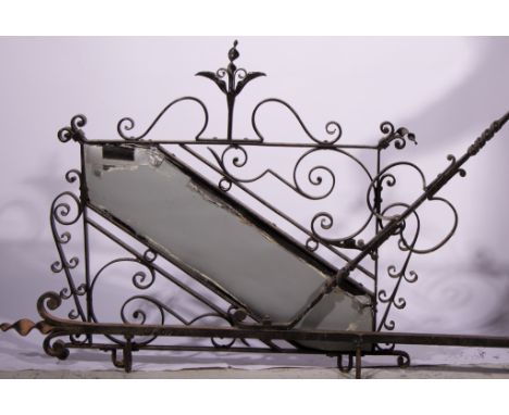 Victorian wrought iron sign, scrolled outlines, 99cm, together with original wall-mounted bracket.