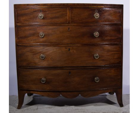 Victorian mahogany bow-front chest of drawers, the top with broad cross-banding and ebony stringing, fitted with two short an