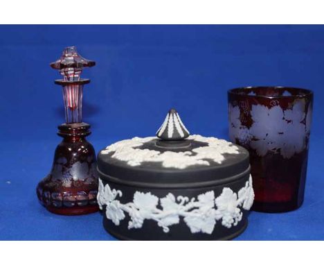 VICTORIAN RUBY GLASS BOTTLE AND STOPPER AND GLASS
the stopper lacking finial; together with a black and white Wedgwood jasper