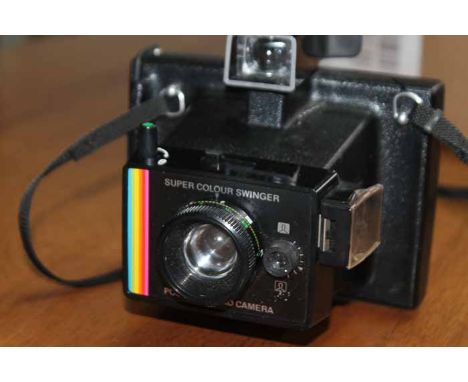 VINTAGE POLAROID CAMERA
boxed