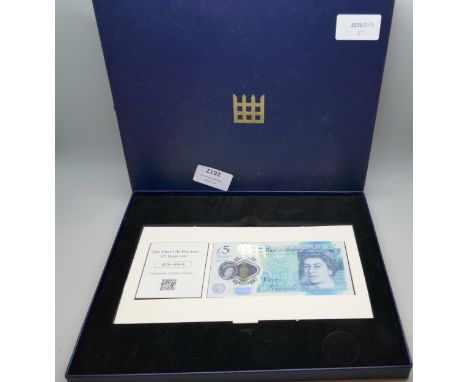 The first UK polymer £5 banknote, in presentation box B05.4624