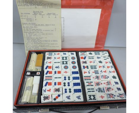 A cased Chinese mahjong set