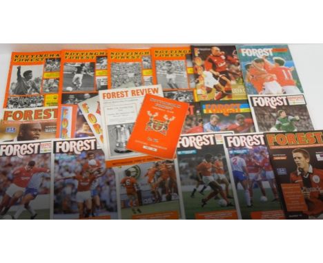 Nottingham Forest Football programmes, dating 1970's together with ten Notts County mugs **PLEASE NOTE THIS LOT IS NOT AVAILA