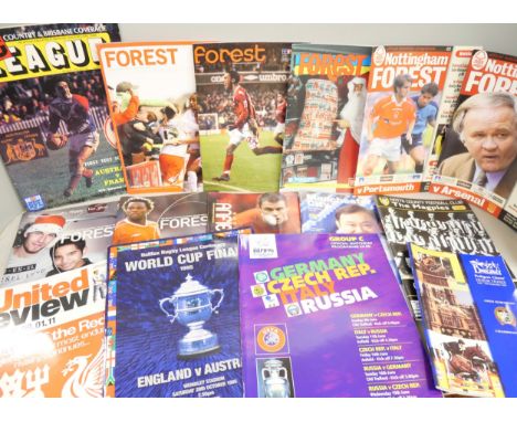 A collection of sporting programmes, including Nottingham Forest, England v Wales Rugby World Cup, Henley Regatta rowing, equ