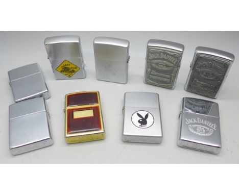A collection of of nine Zippo lighters **PLEASE NOTE THIS LOT IS NOT ELIGIBLE FOR IN-HOUSE POSTING AND PACKING**