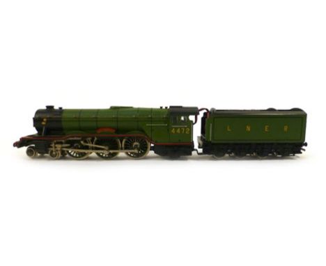 A Trix Twin OO gauge 'Flying Scotsman' 4-6-2 engine and tender, green LNER livery   CONDITION REPORT:  Playworn